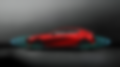 Blurred passenger rear side view of red Mazda3 on highway showing radar pulses radiating outwards from front and back.