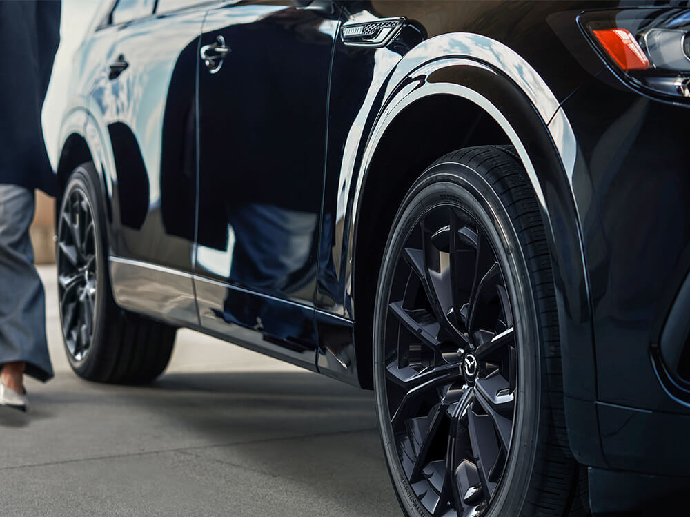 Close up of front right wheel on the CX-7o Inline 6 Turbo.