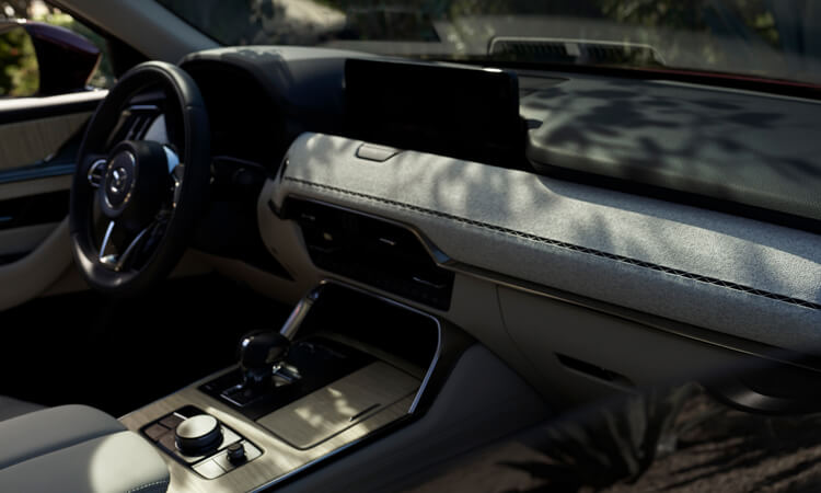 View from passenger side of the dash and console from inside the CX-90.