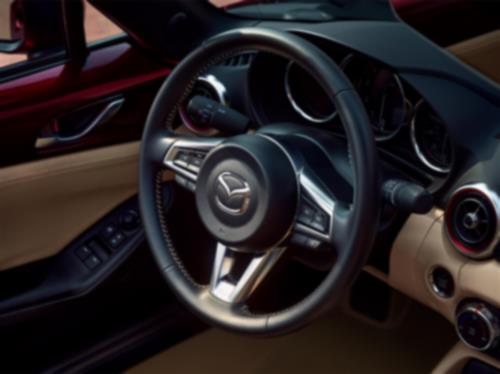 Close-up view of the MX-5 ST 35th Anniversary Edition steering wheel. 